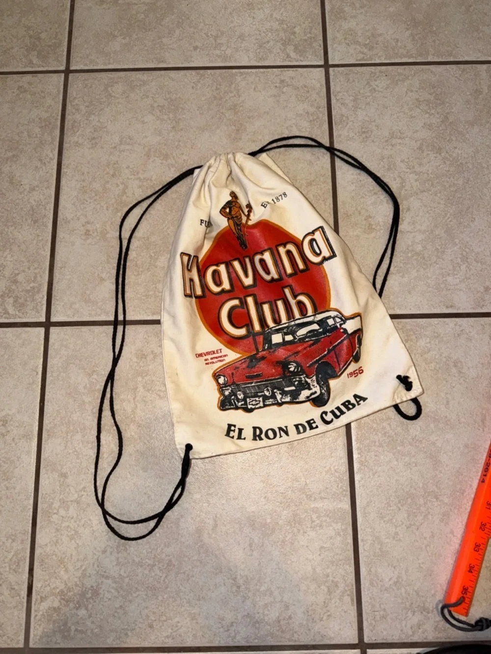 Cream Drawstring Backpack with Red Graphic